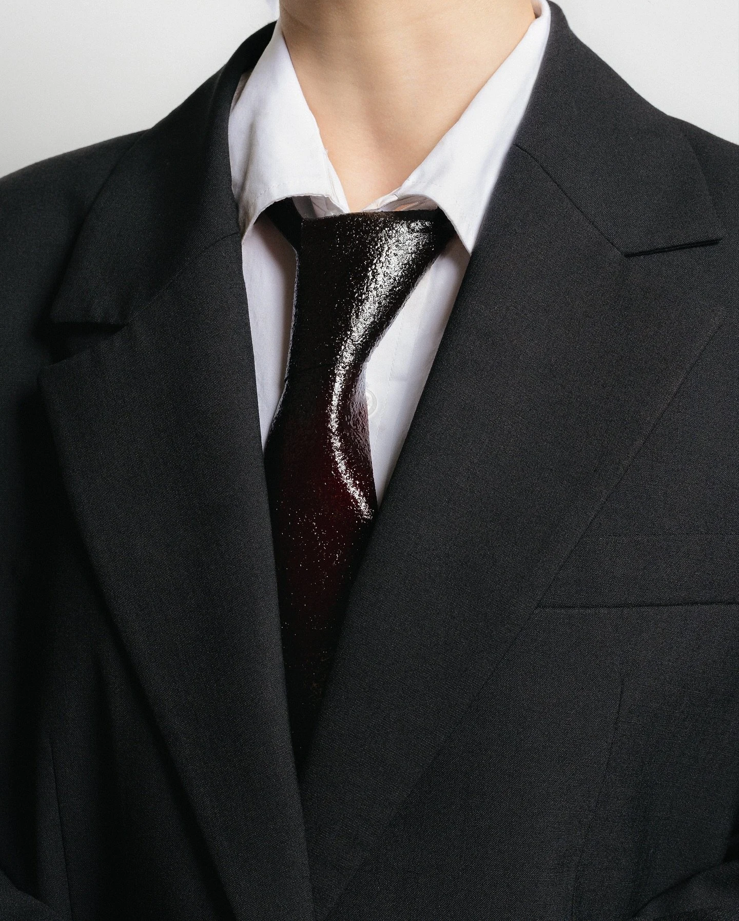 Fall Issue: Suits and ties still hold court this season. The tie stays sharp, its lines cut clean from fruit leather that looks nearly indistinguishable from the original. The illusion holds until you&rsquo;re close enough to notice the sheen, the hi