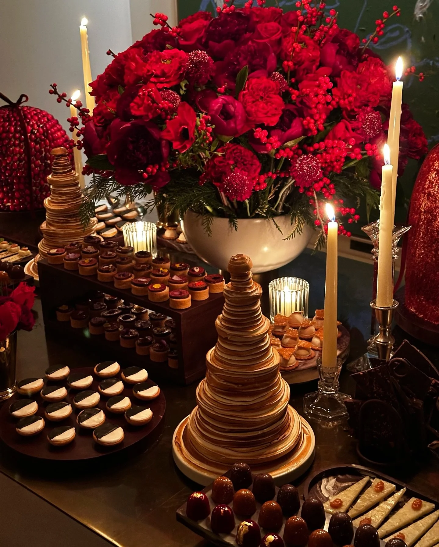 Celebrated @simonhuck and @piptherip&rsquo;s annual holiday party with a custom dessert table featuring marble displays sculpted entirely in chocolate, alongside mousse with berries and caviar paired with champagne. Designed and made in-house.
