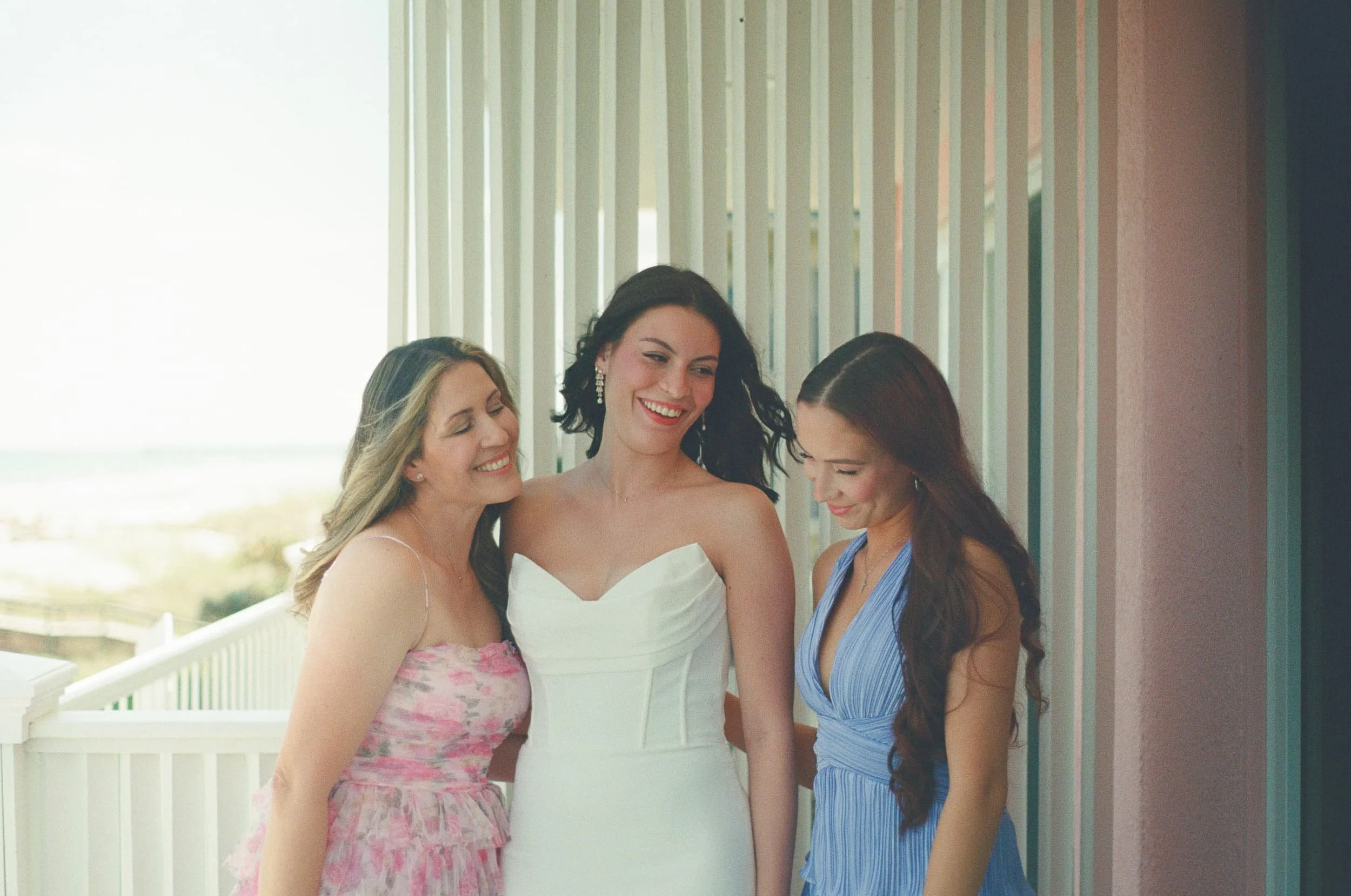 bride looking happy with her family, wedding photographer, tampa florida