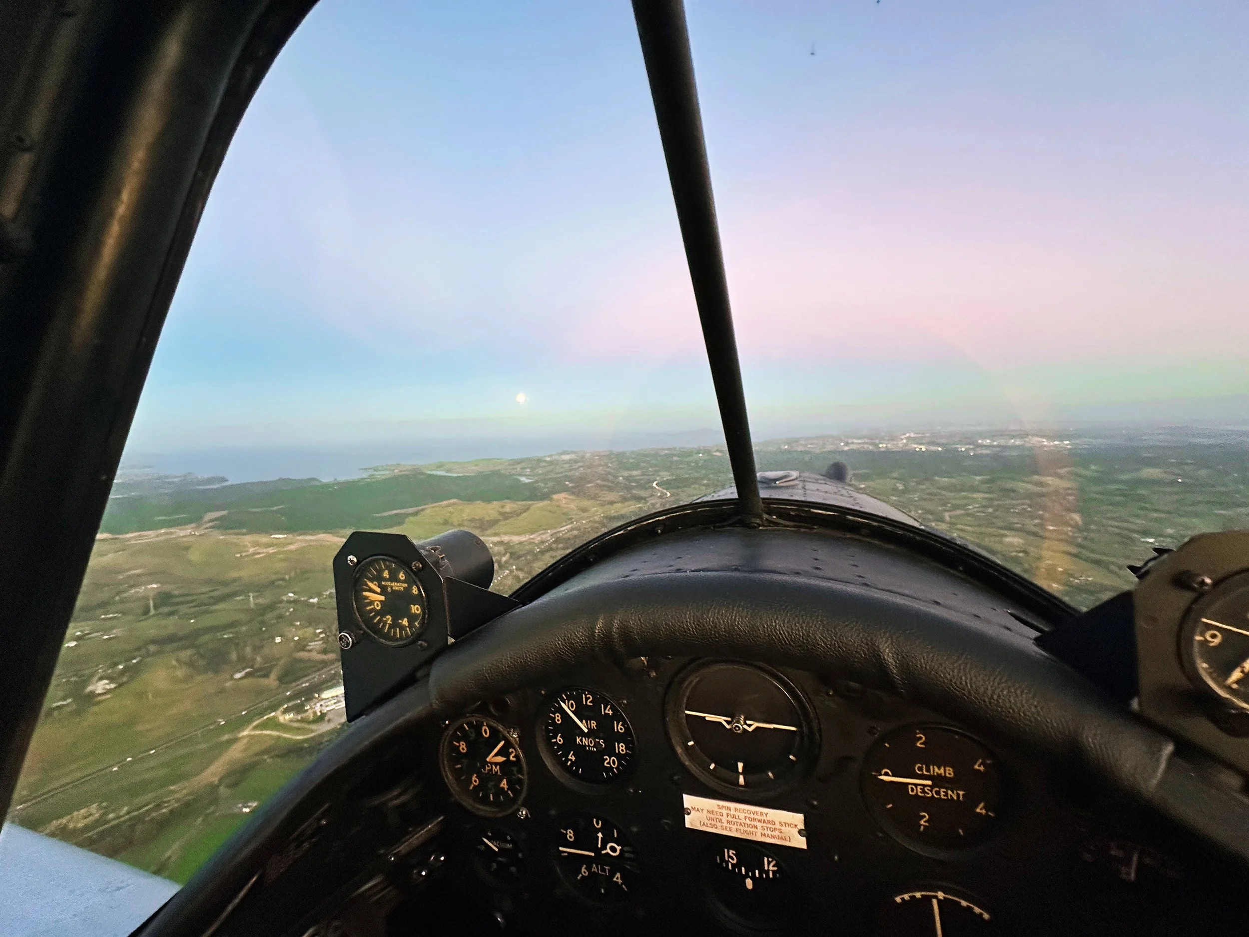 Pilot's view from an early test flight. G meter is on the left and clock is on the right. The clock is handy for tracking fuel consumption as the gauges aren't easy to read in flight.