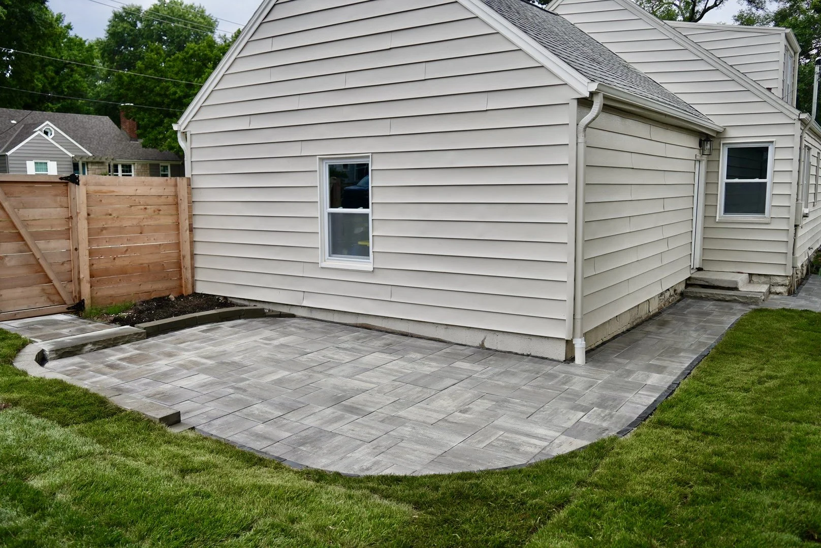 Installation of a Brand New Paver Patio including patio area, walkways and stoops.