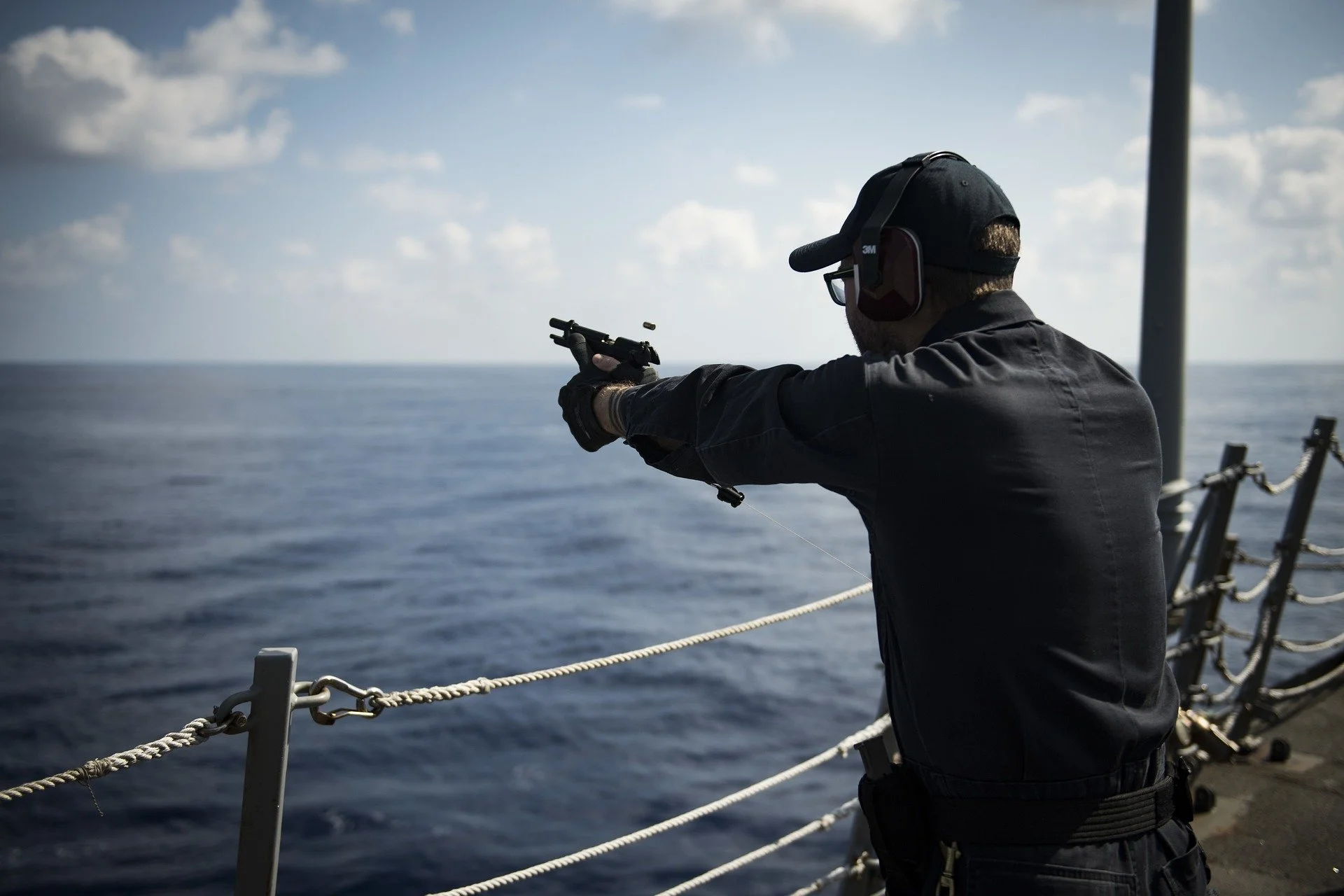 Men shooting at sea training.jpg