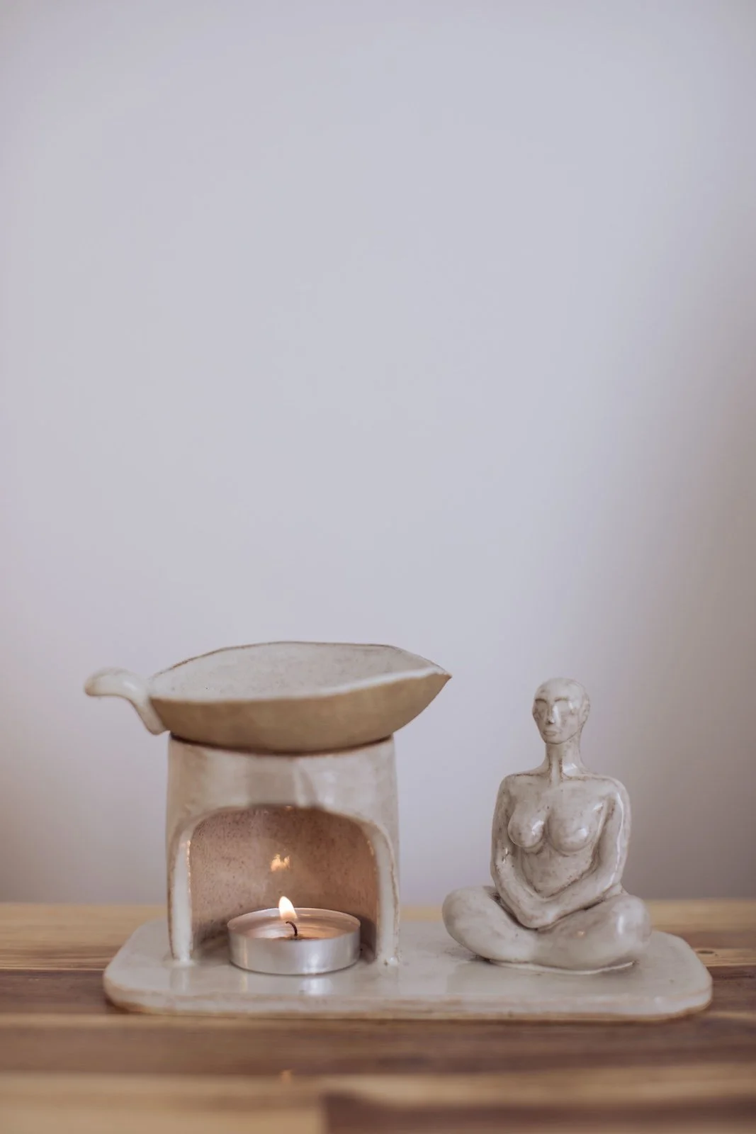 Ceramic sculpture at Byron Health Studio in Ocean Shores to hold warm massage oil in remedial massage treatments