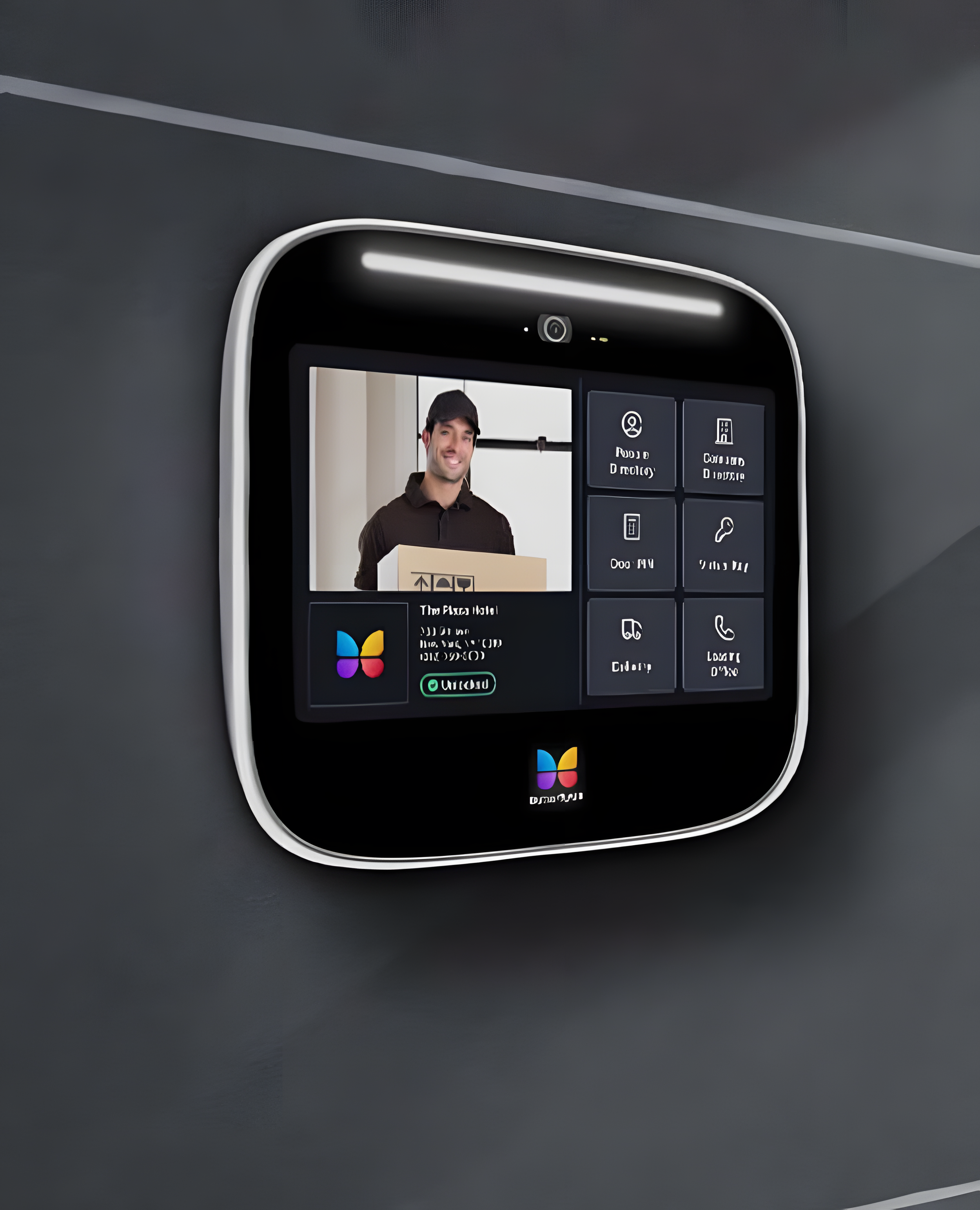 Wall-mounted smart home tablet at Stanhope Foundry Brooklyn condo with video call and service icons.