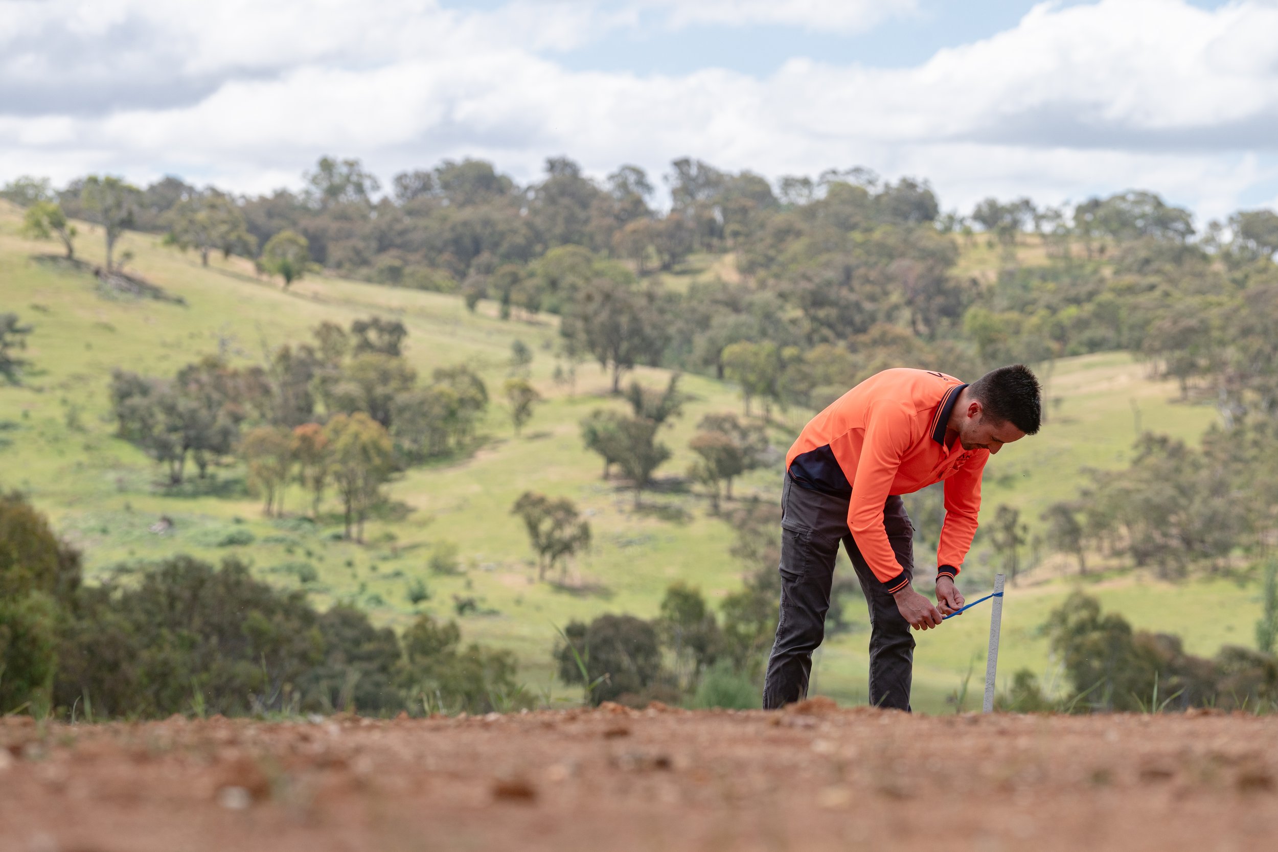 Licensed surveyor working on a subdivision project