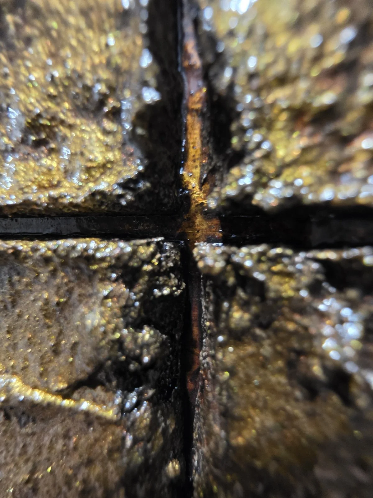 Extreme close‑up of Obelisk VI : After, revealing glaze filling gaps between raised cubes.