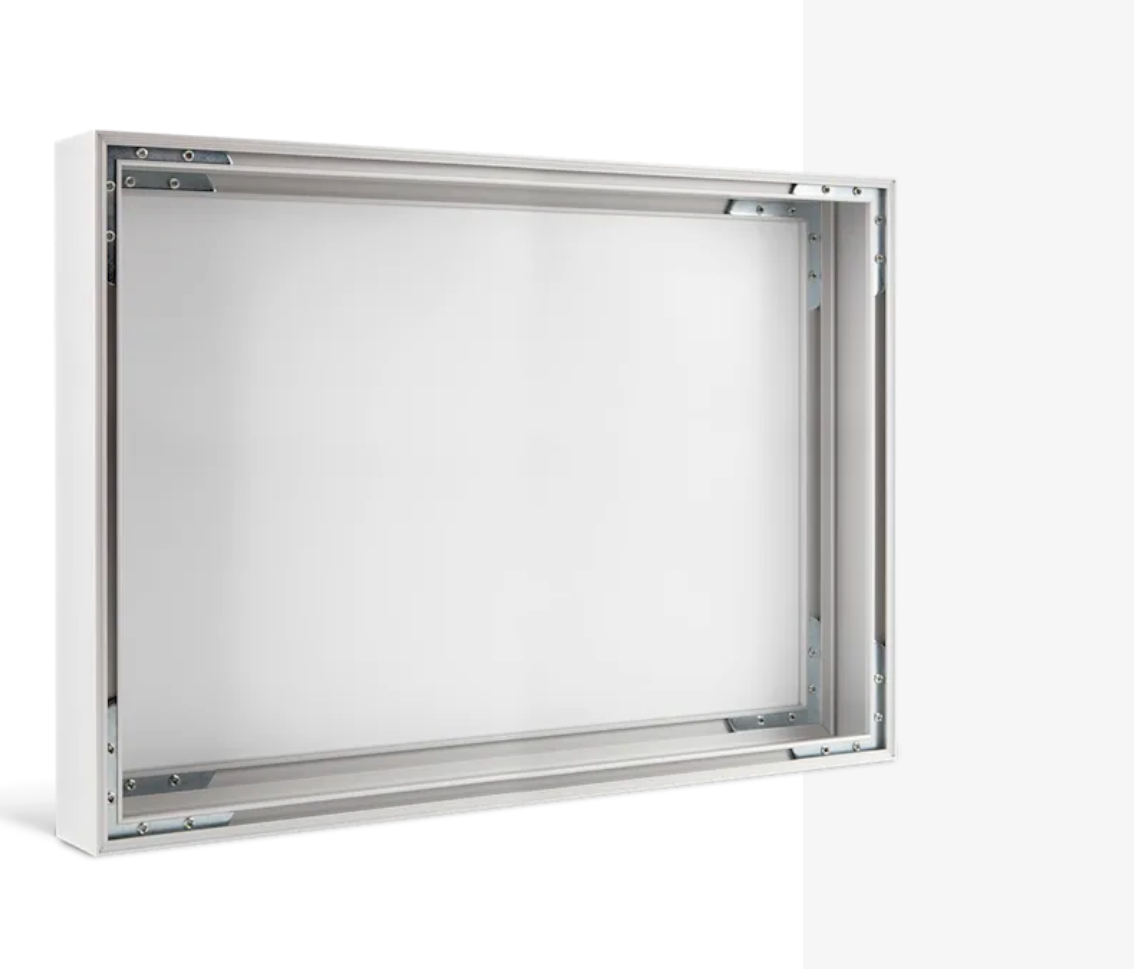 Empty white, rectangular electrical or light box with metal frame, mounted on a wall.