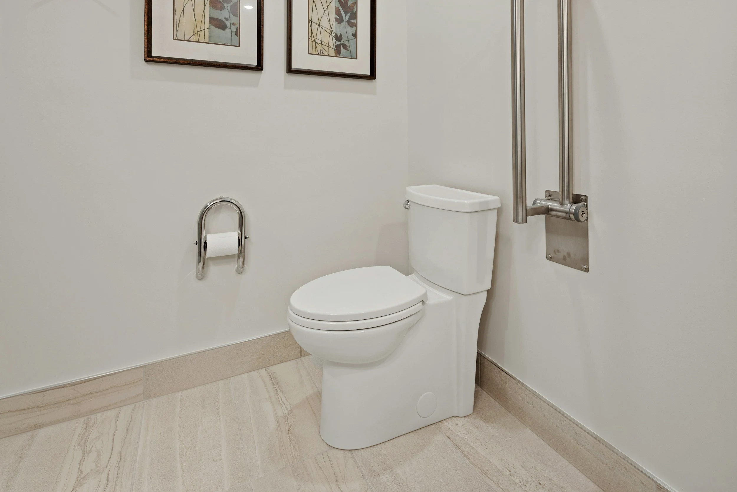 Licensed plumber repairing toilet flush system in Adelaide