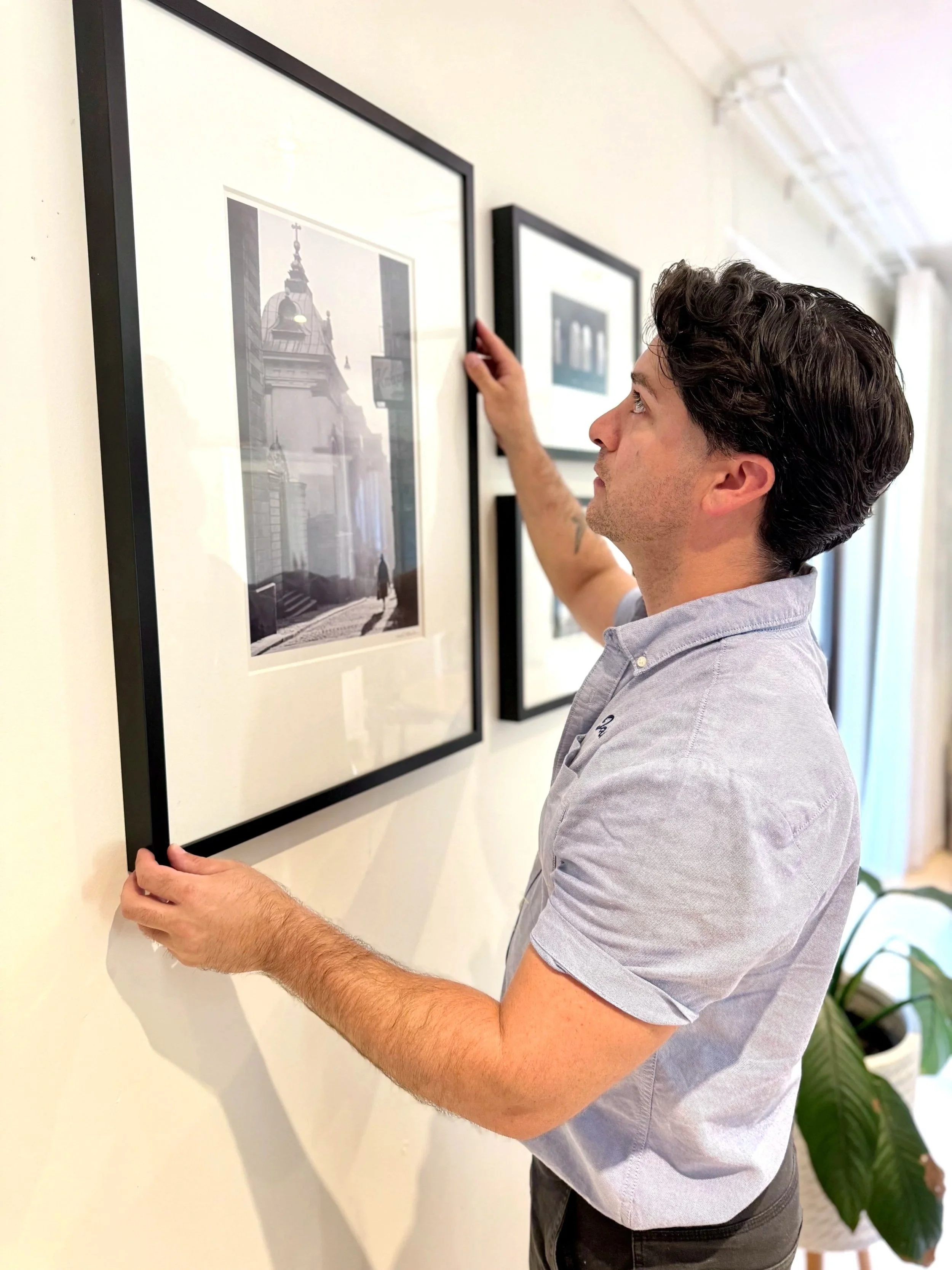 Handyman installing wall shelves in Adelaide home, handyman installing wall hangings in adelaide home or business.