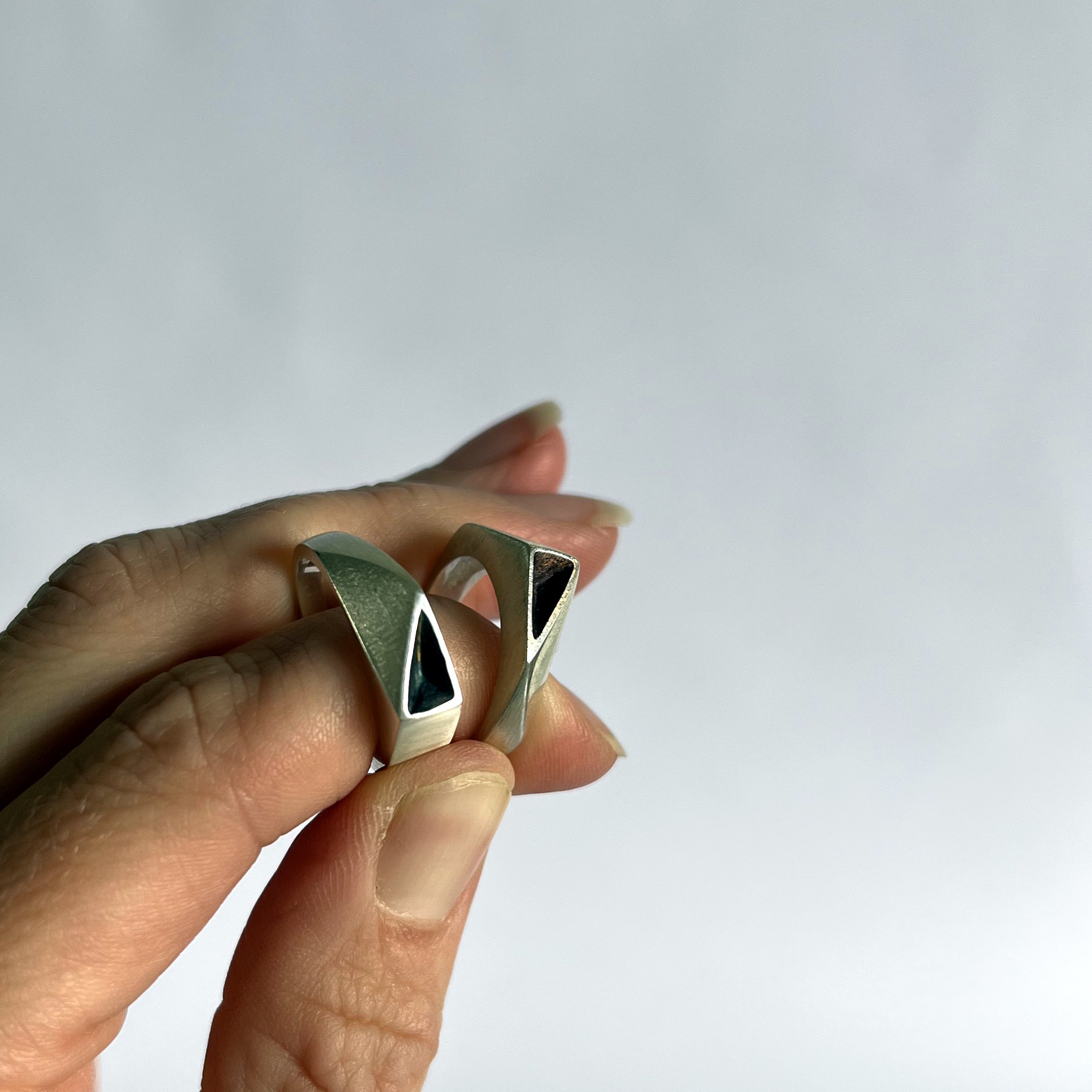 Oxidised cast silver ring collaboration in a contemporary minimal style