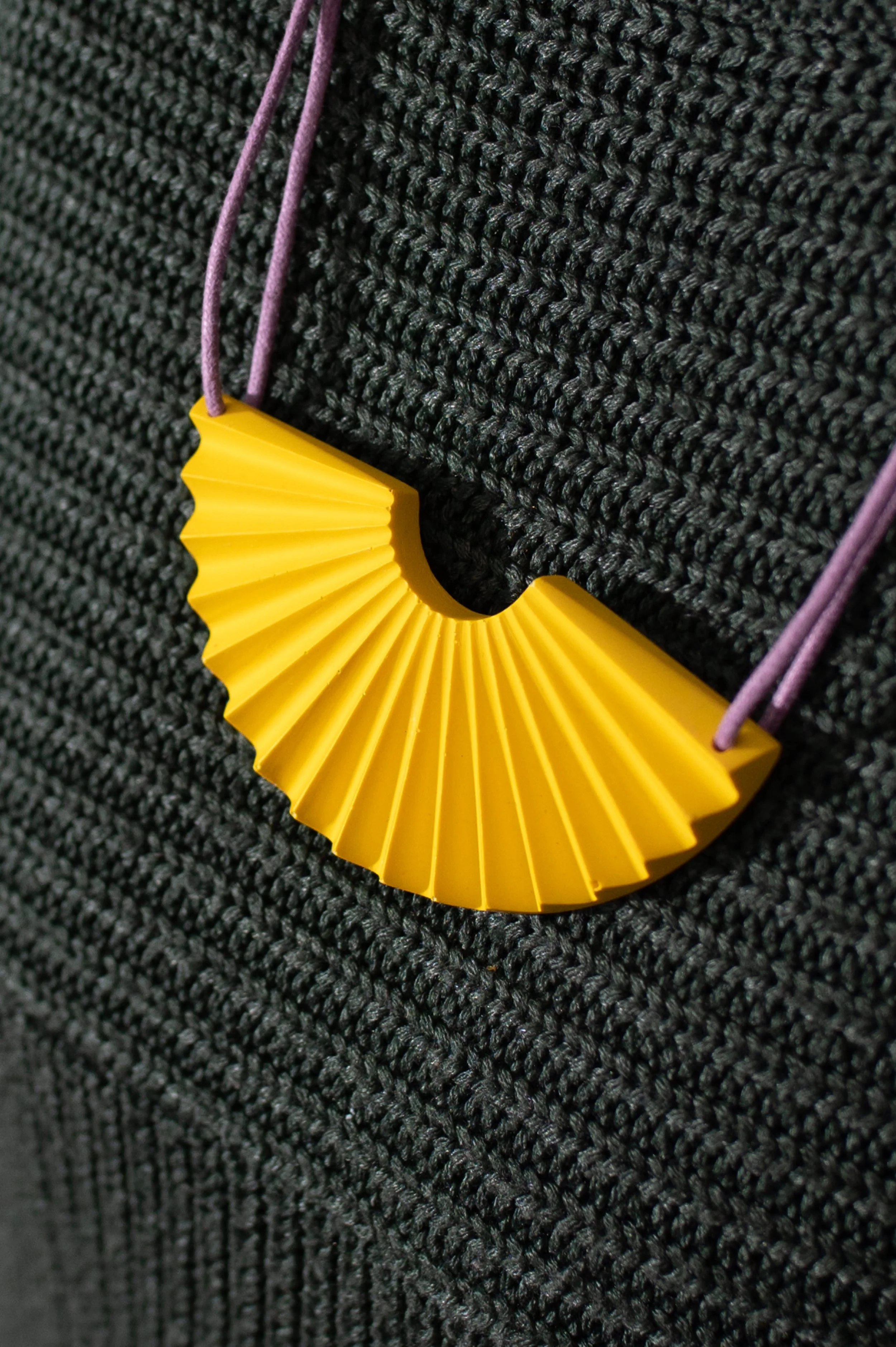 yellow jesmonite fan shaped statement necklace with adjustable black cord designed by studio mariscat