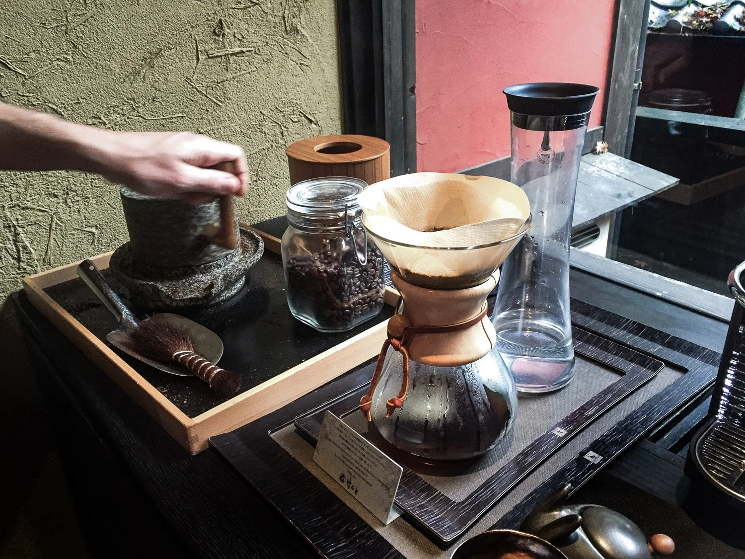 Coffee station in our room with a stone coffee grinder - hand ground coffee prerperation