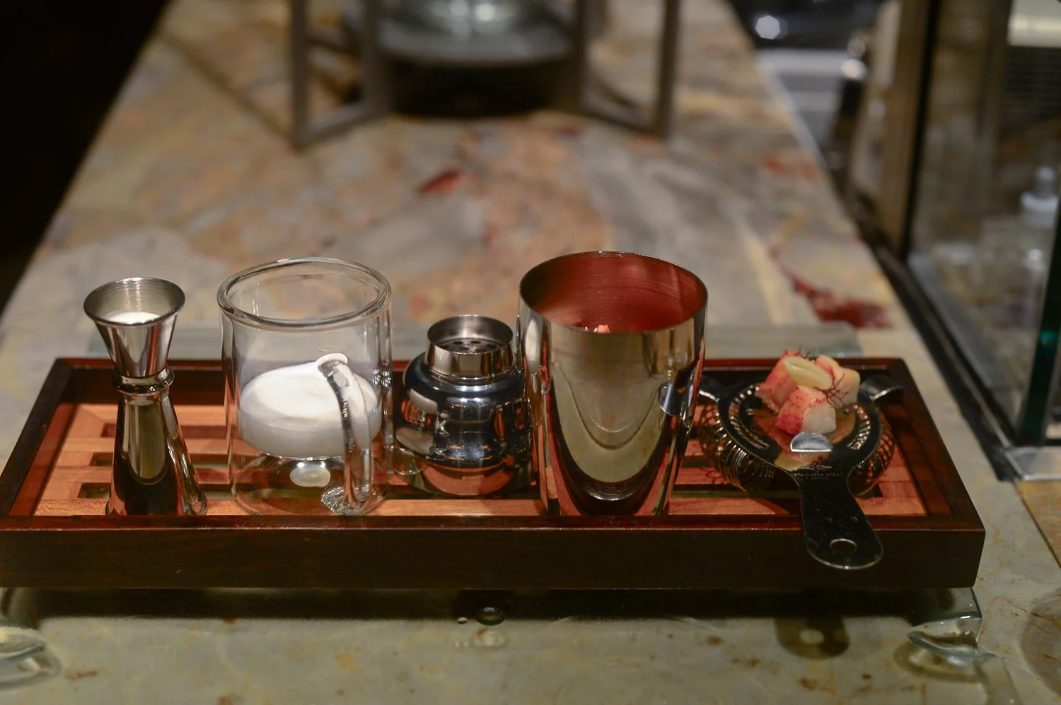  Cappuccino Cream and butter in the jigger, foam in the cup, lobster bisque in the shaker, and lobster on the strainer; all to be mixed, shacked and consumed. 