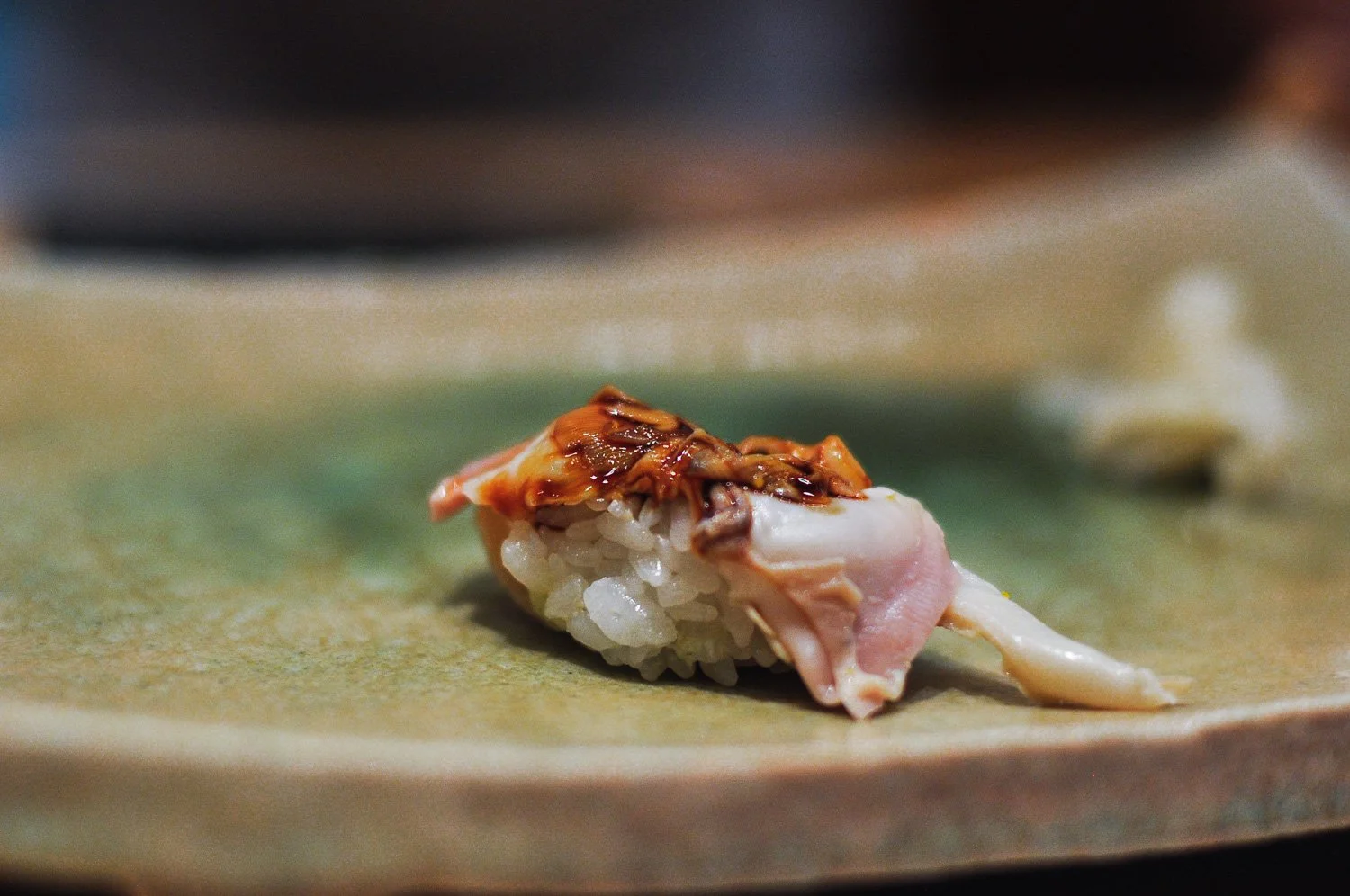 Hamaguri a large variety of Japanese clam, first simmered in a broth and then touched with a sweet sauce.