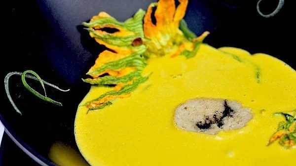  Cream of pumpkin blossoms and turmeric with toasted almonds and chile poblano 