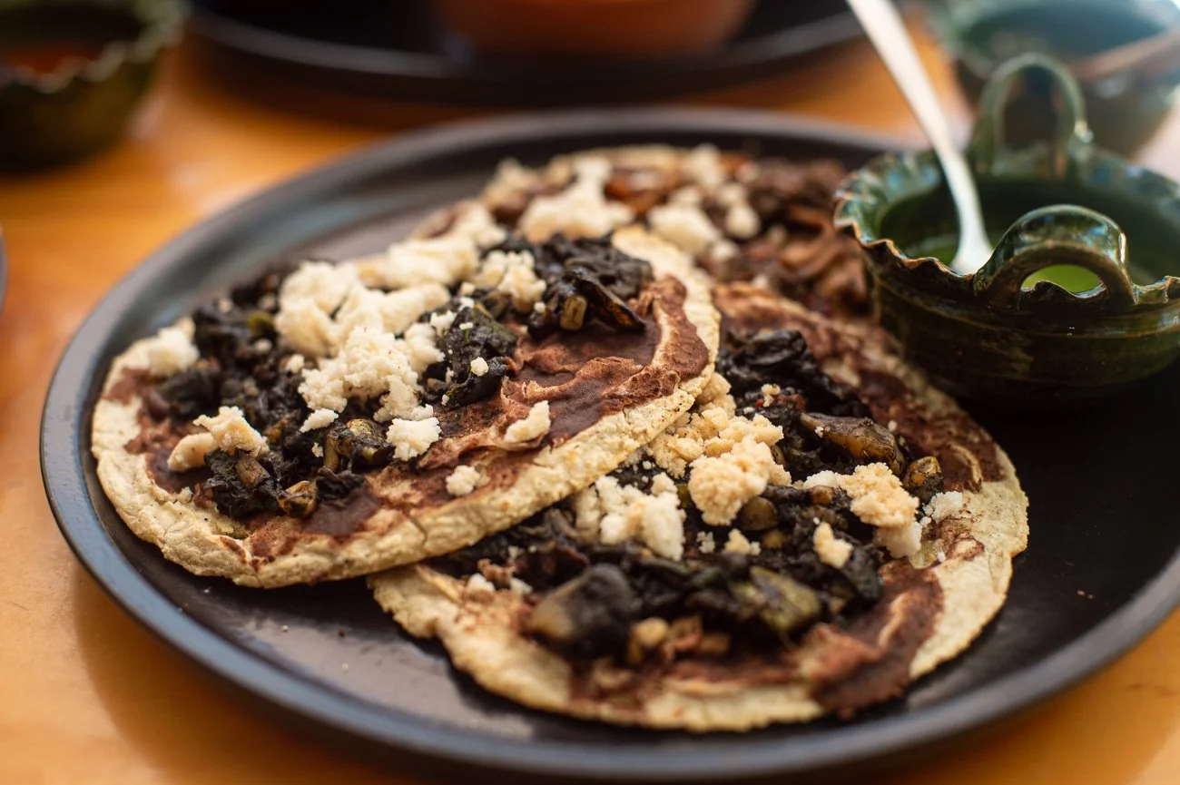 Memelas with a sampler of salsas and  a guacamole
