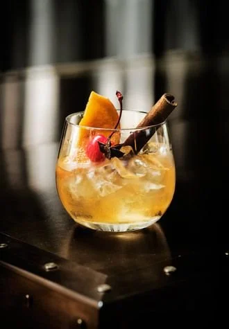 Spiced Old Fashioned Buffalo Trace Bourbon, Orange, Cherry,    Anise, Cinnamon Stick, Cloves and Syrup   (Photo ©  Joice Wang)