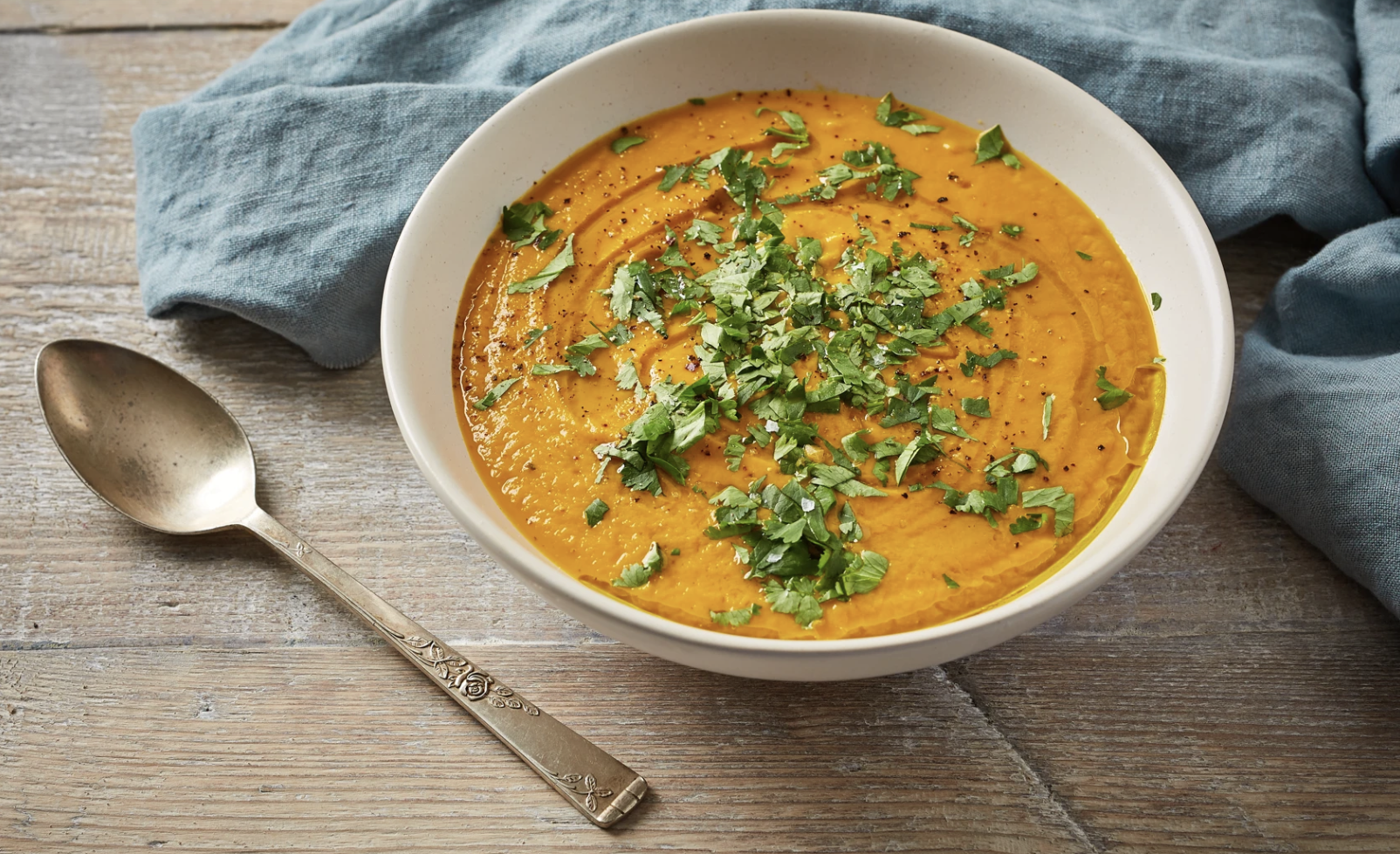 Warming Carrot Soup with Spiced Carrot Green Paste