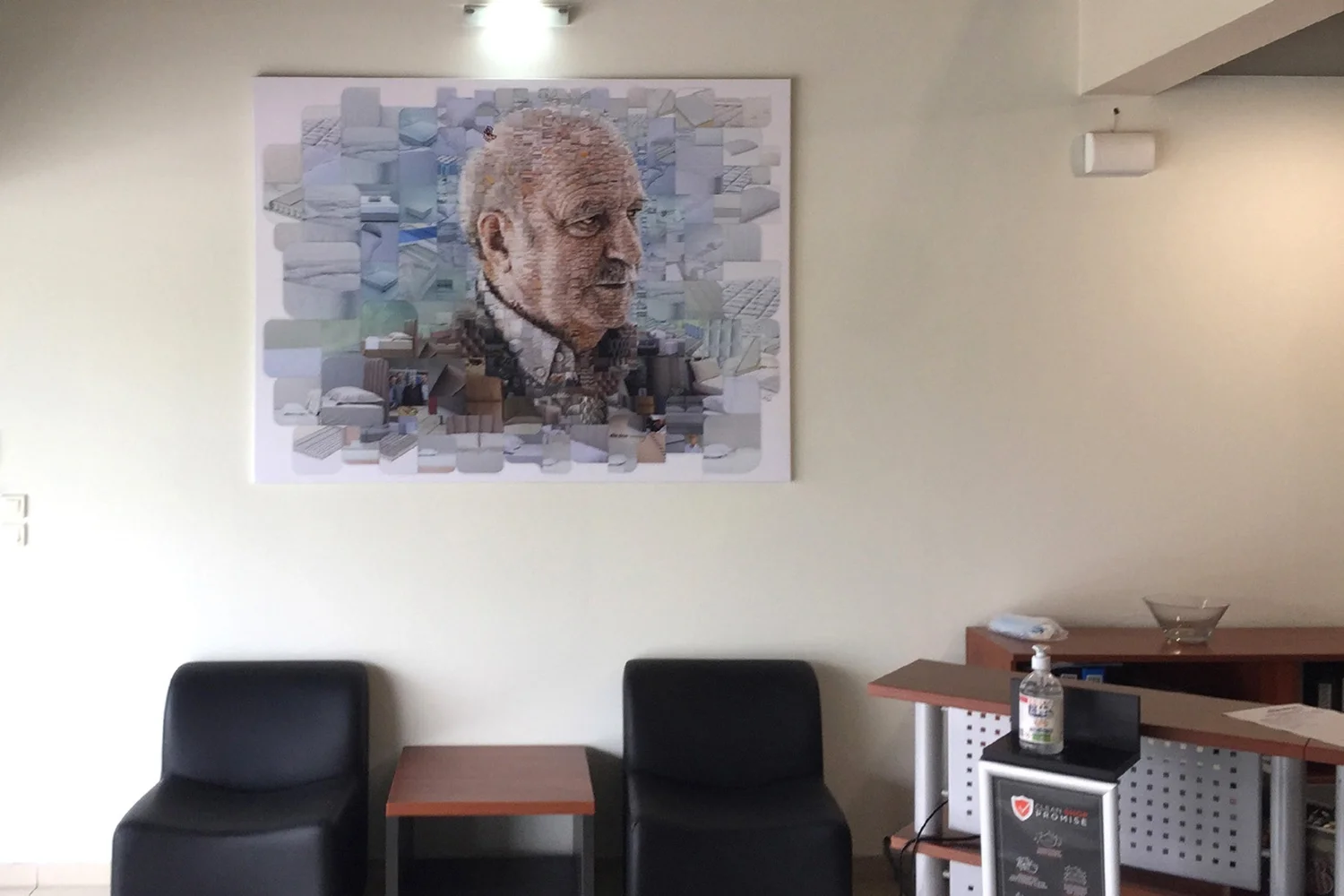 Mosaic portrait of a company founder in a lobby, custom corporate portrait