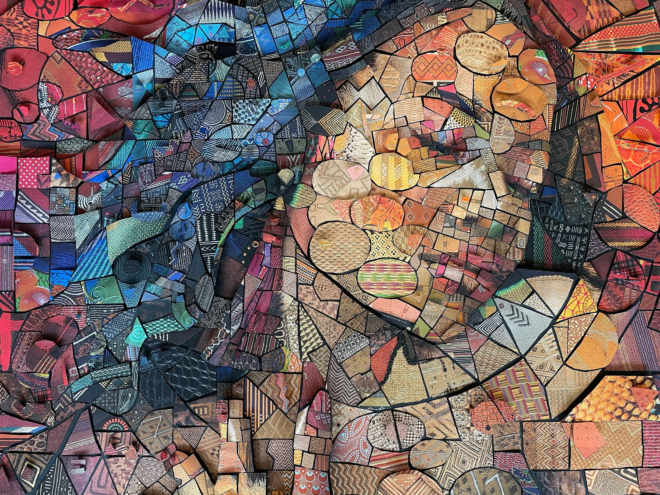  hand-cutting individual paper tiles for the analog version of The African Bricks 