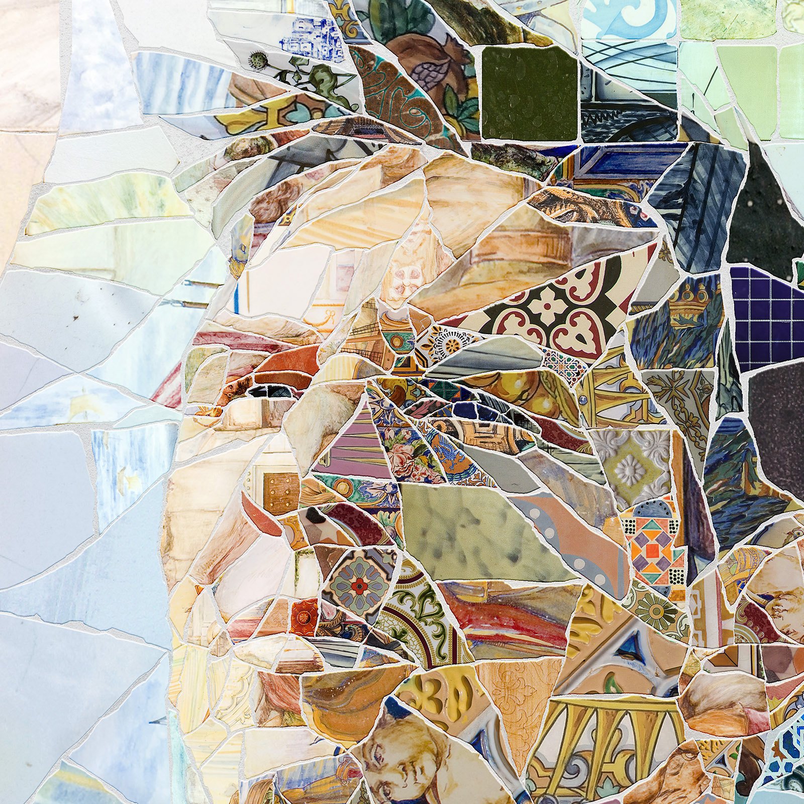   Close-up of Messi trencadís mosaic – jagged ceramic shards, and azulejo pieces.  