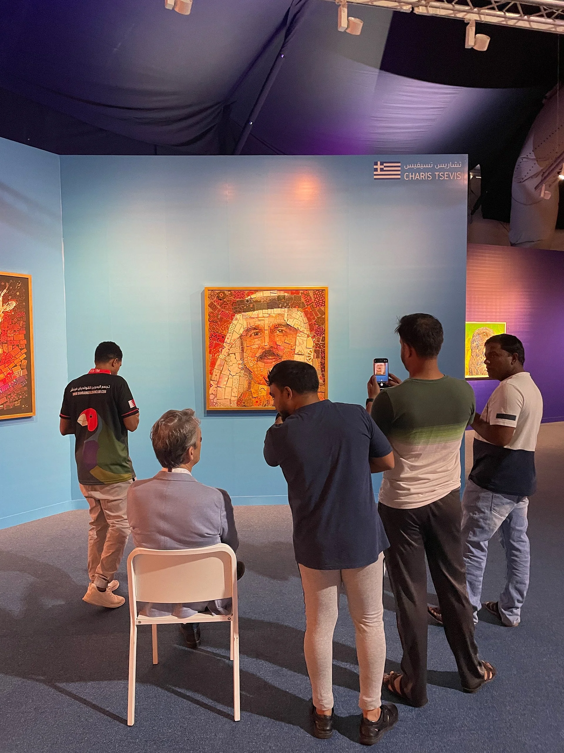 tsevis-visitors-admire-charis-mosaic-portrait-gallery.jpg