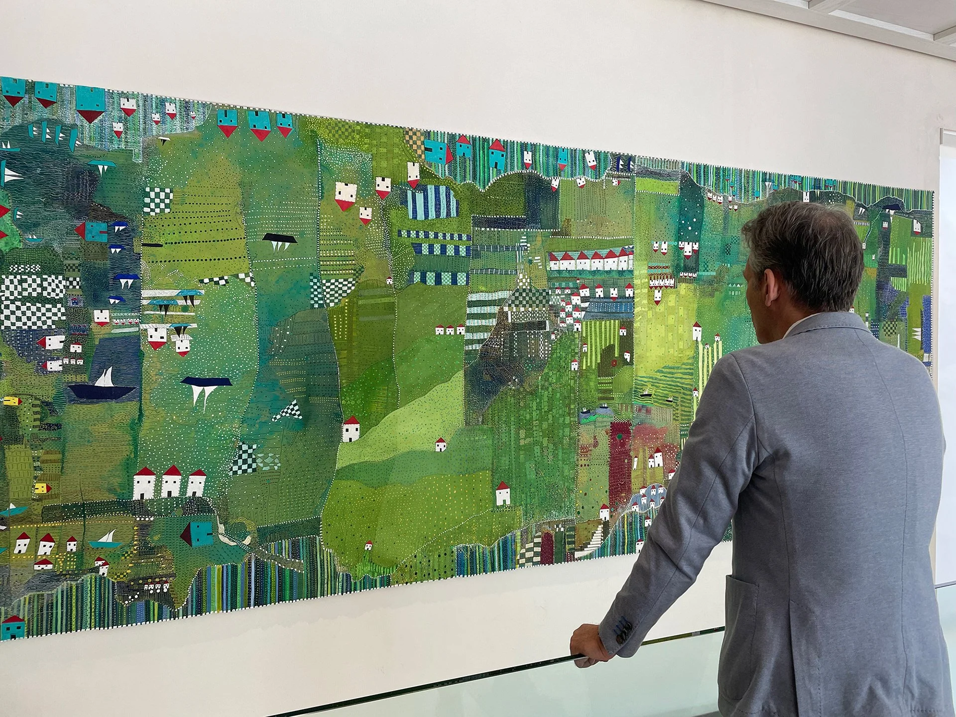 tsevis-man-observes-yoko-ono-patchwork-landscape.jpg