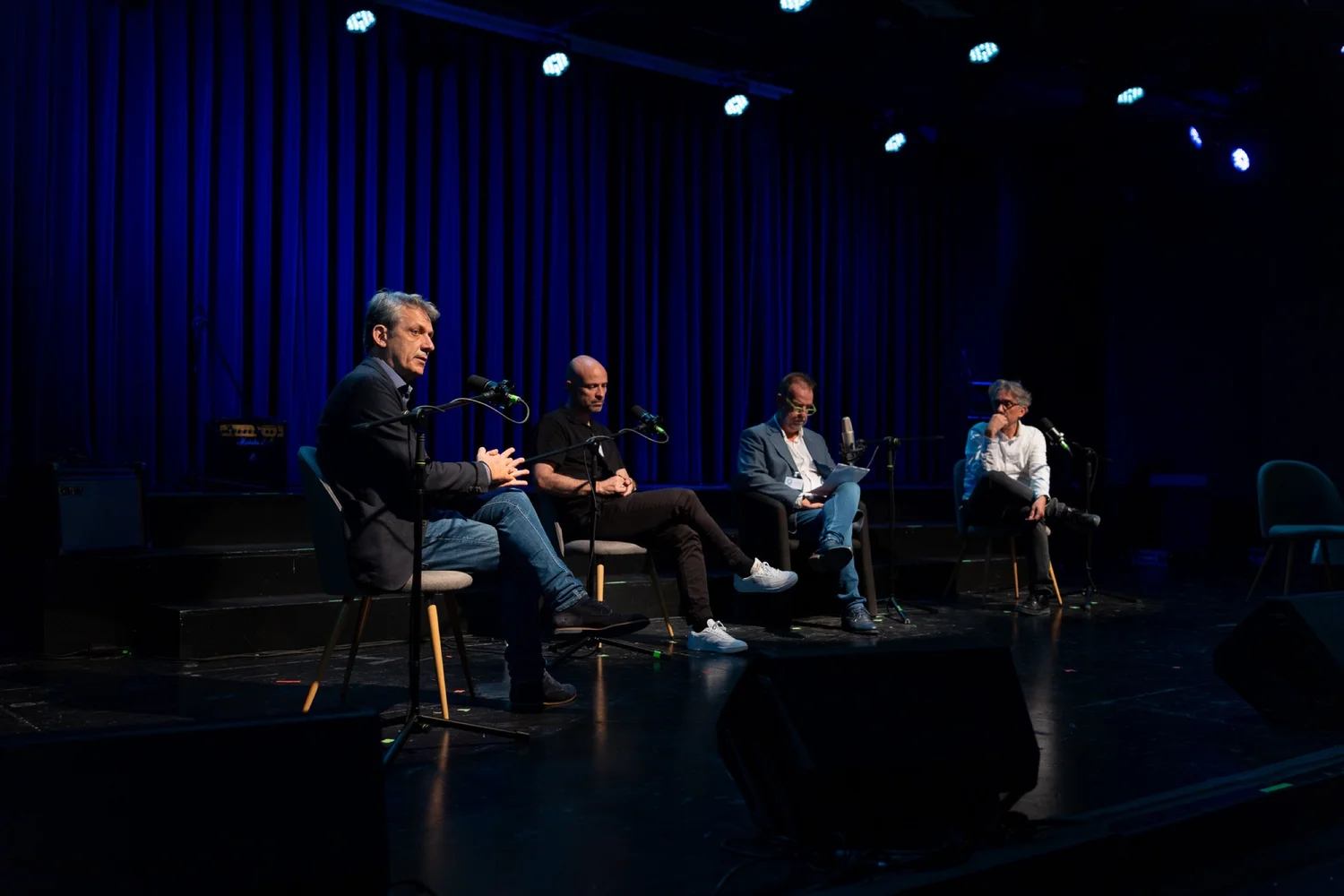 Panel discussion image featuring a graphic design professional in branding and advertising leaders at the EALL event in Athens.