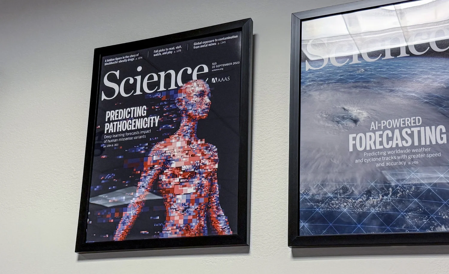 An exhibition display featuring a Science magazine cover artwork that visualizes the evolving field of artificial intelligence through a digital mosaic technique