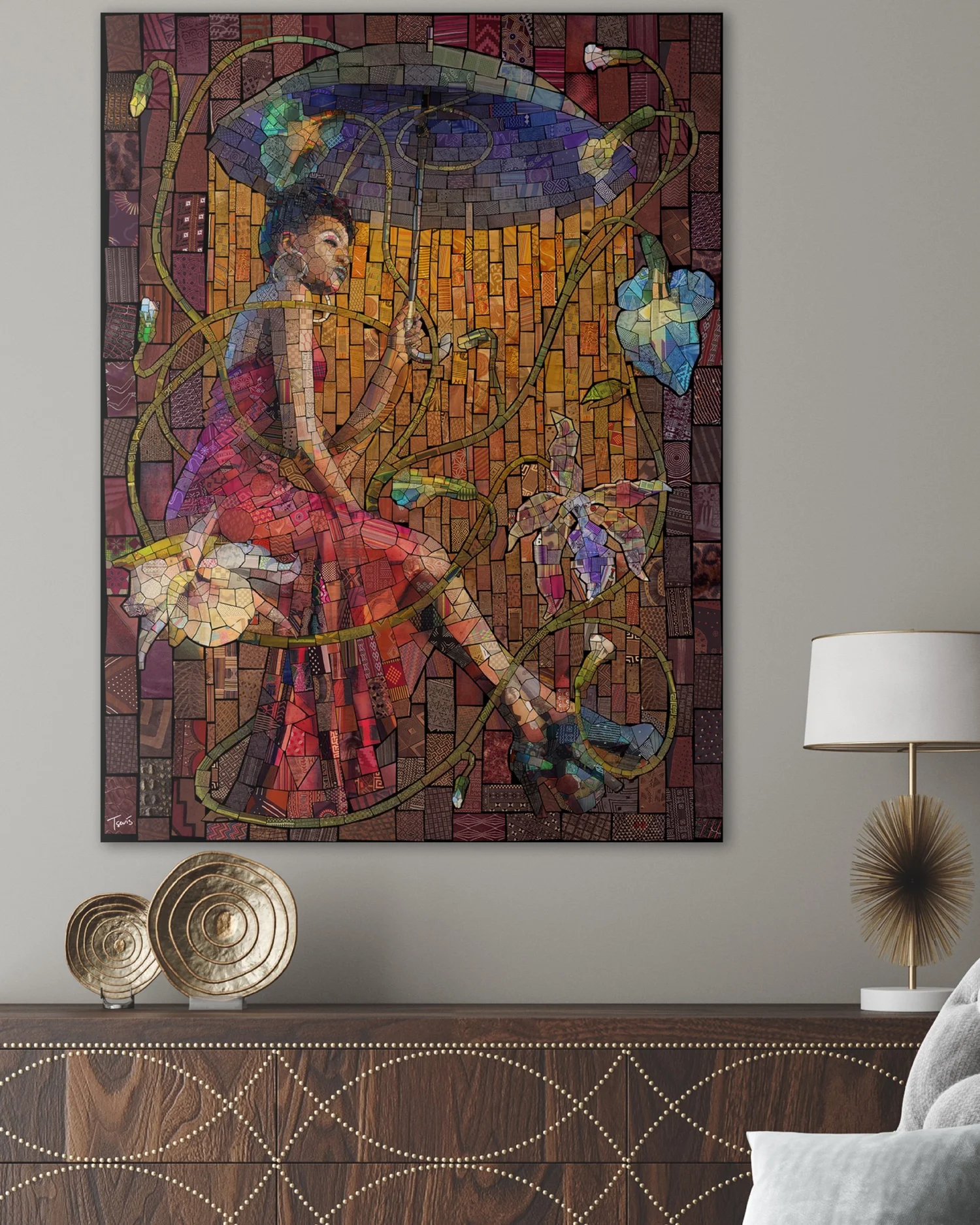 Framed mosaic of a seated woman in a red dress holding an umbrella, with flowers, shown above a wooden sideboard