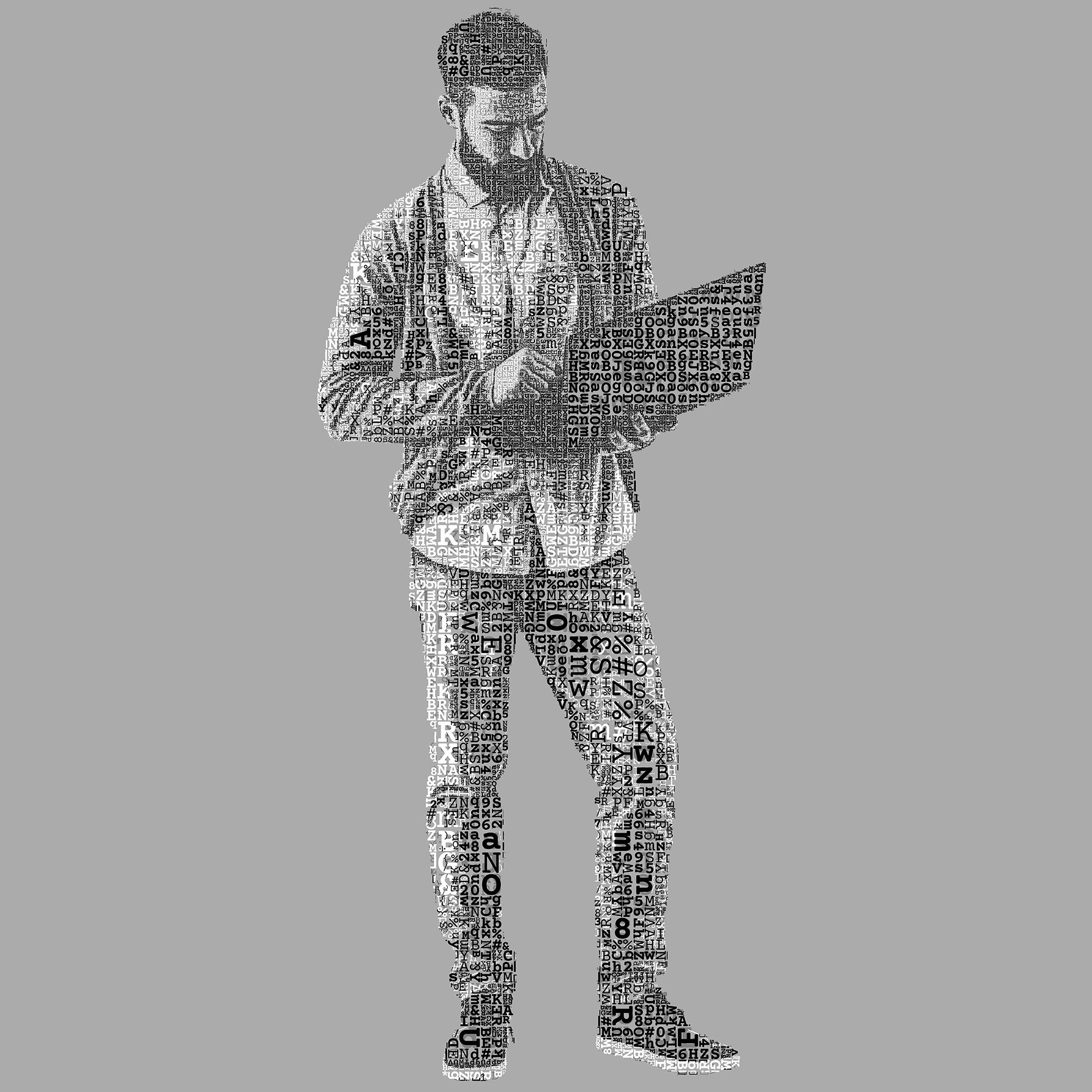 A man coding typographic mosaic