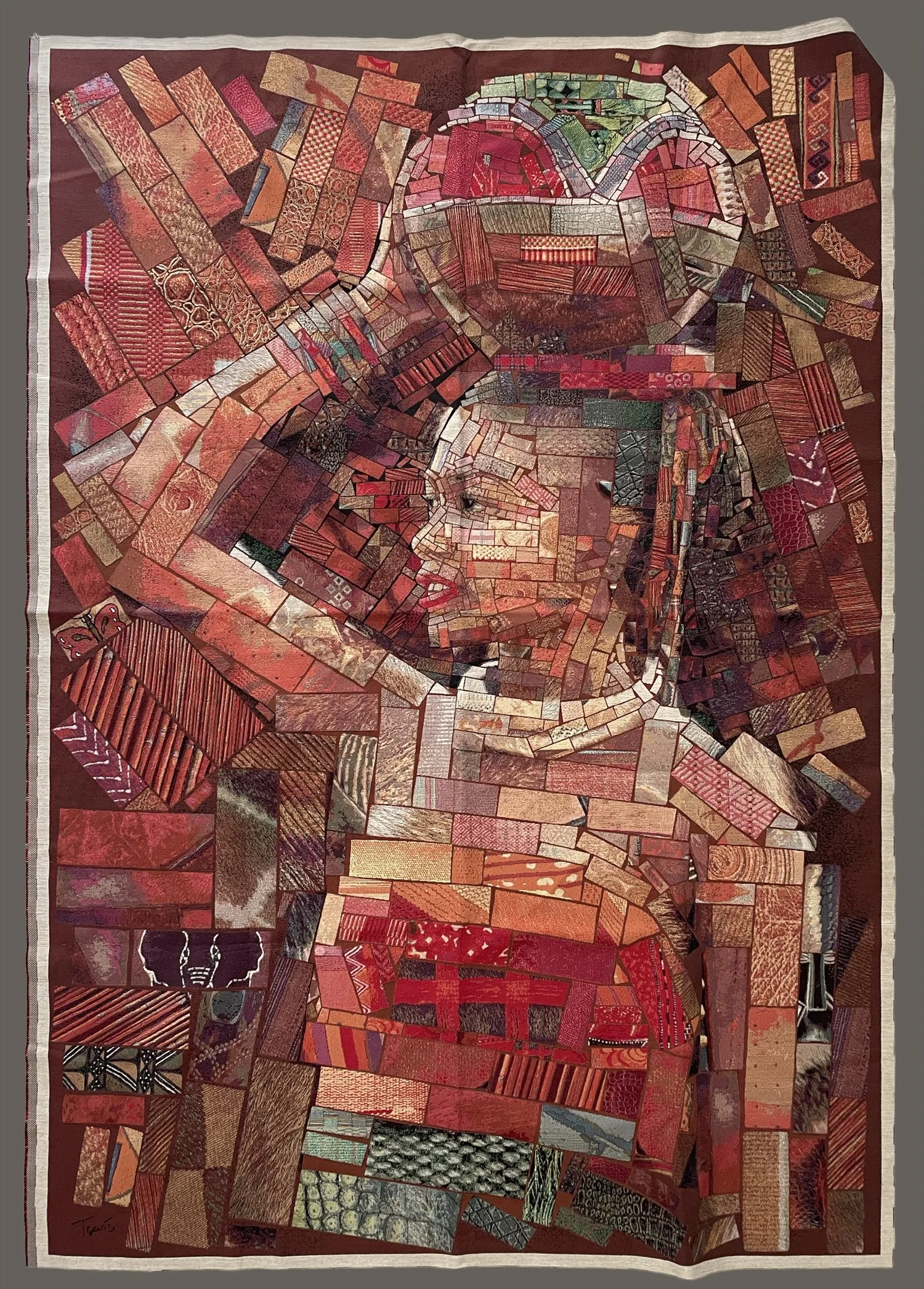 Woven jacquard textile of a mosaic portrait of a woman in profile, built from red and brown patterned brick-like tile pieces