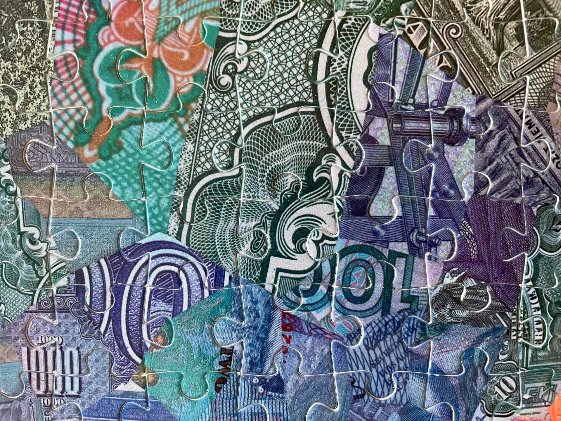 tsevis-assembled-puzzle-fragmented-currency-notes.jpg