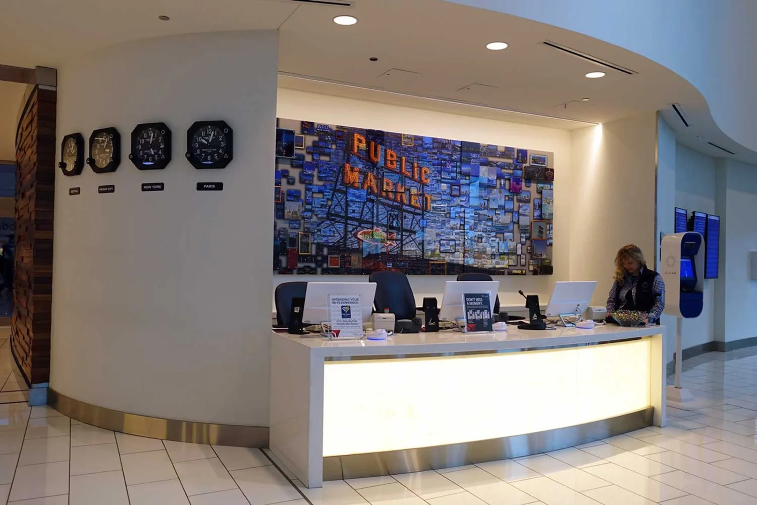 Custom mosaic artwork installed in a modern lobby, airline mosaic art
