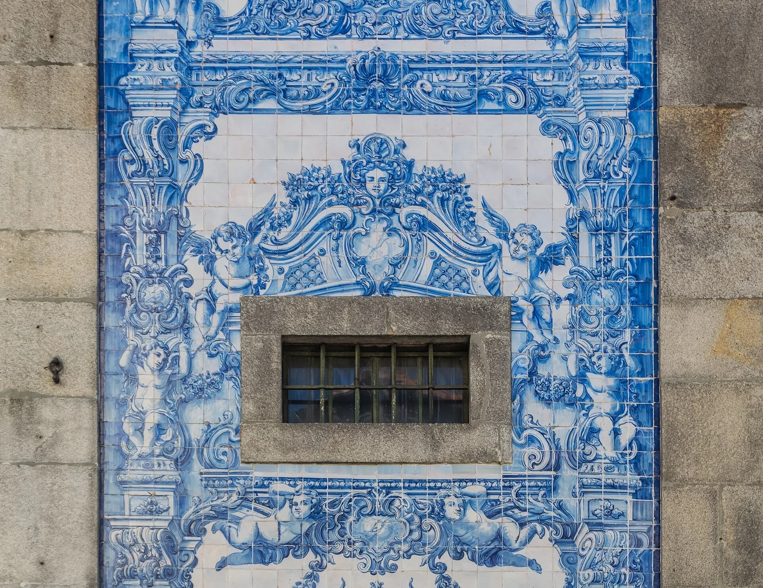Blue and white azulejo facade of the Capela das Almas chapel in Porto