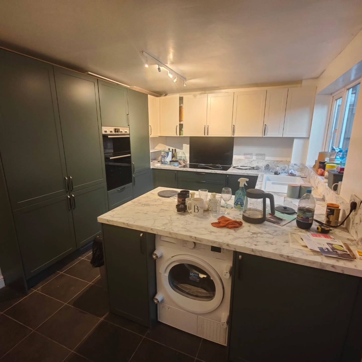 And we're up and running.!
Our First kitchen designed and fitted with love for the family.

Finished in two tone Shaker Magnolia at the top and Thyme Green on the base to brighten and warm up the room. Laminate worktops making a difference to the fee