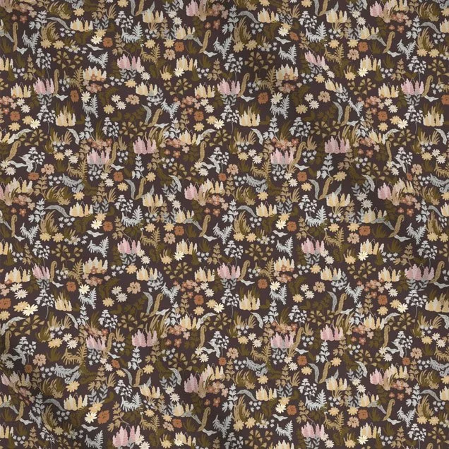 Dark brown background with pastel flower pattern on fabric