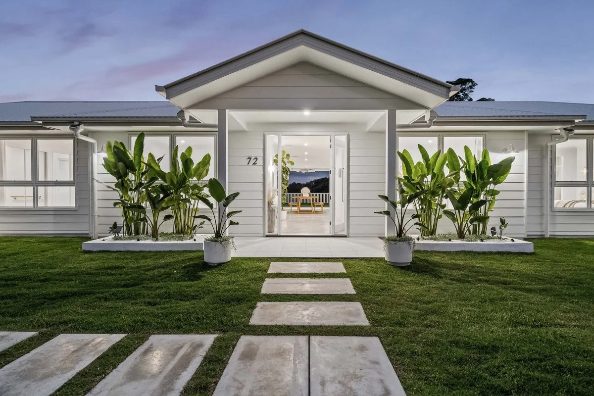 front steppers and gardens.jpeg