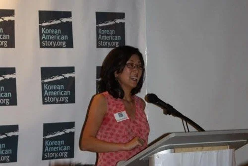  Theresa Choh-Lee, a board member, addressing the audience 