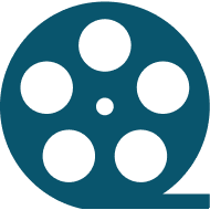 A film reel with five circular holes.