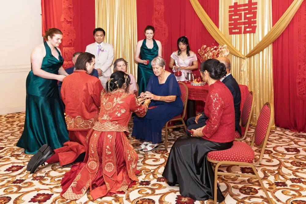 Khristy and Chris during their wedding tea ceremony in Richmond, Virginia.