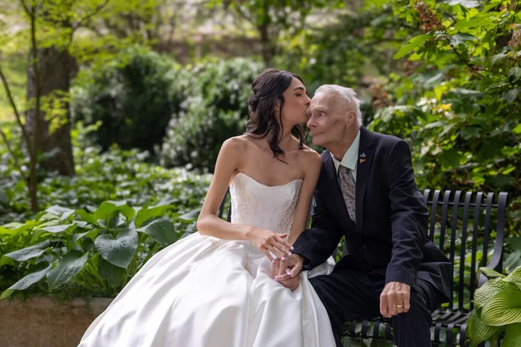 Jenai sharing a candid moment with her father on her wedding day.