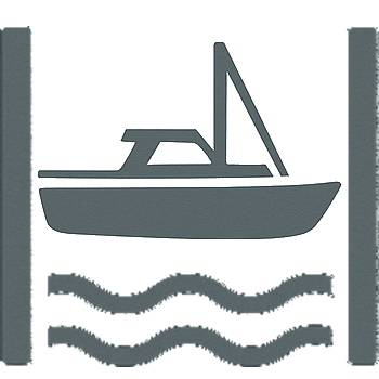 A boat docked between two vertical posts with water underneath.