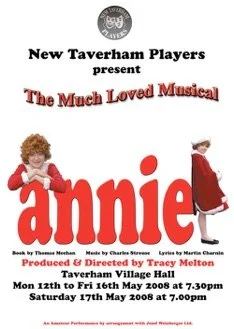 Poster for the musical 'Annie' presented by New Taverham Players, featuring a young girl with curly hair in a red outfit and a girl in a red coat with a backpack, showing performance dates and times in May 2008.