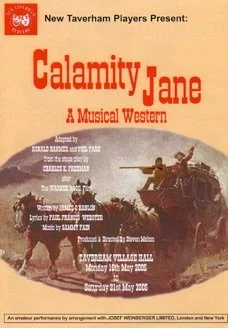 Poster for the musical Western 'Calamity Jane' presented by New Taverham Players. Features an illustration of a woman on a horse and a scene with soldiers and a gun mounted on a vehicle. Text details the production and date.