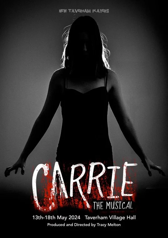 Poster for the musical "Carrie" featuring a silhouette of a girl with outstretched arms against a dark background. Text indicates show dates from May 13th to 18th, 2024, at Taverham Village Hall, produced and directed by Tracy Melton.