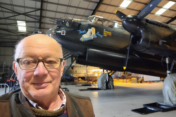 Chris S in an aeroplane hangar