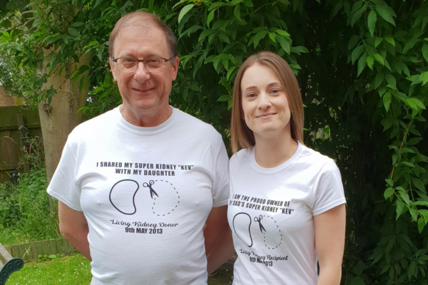 Kathryn and her father wearing kidney transplant T shirts