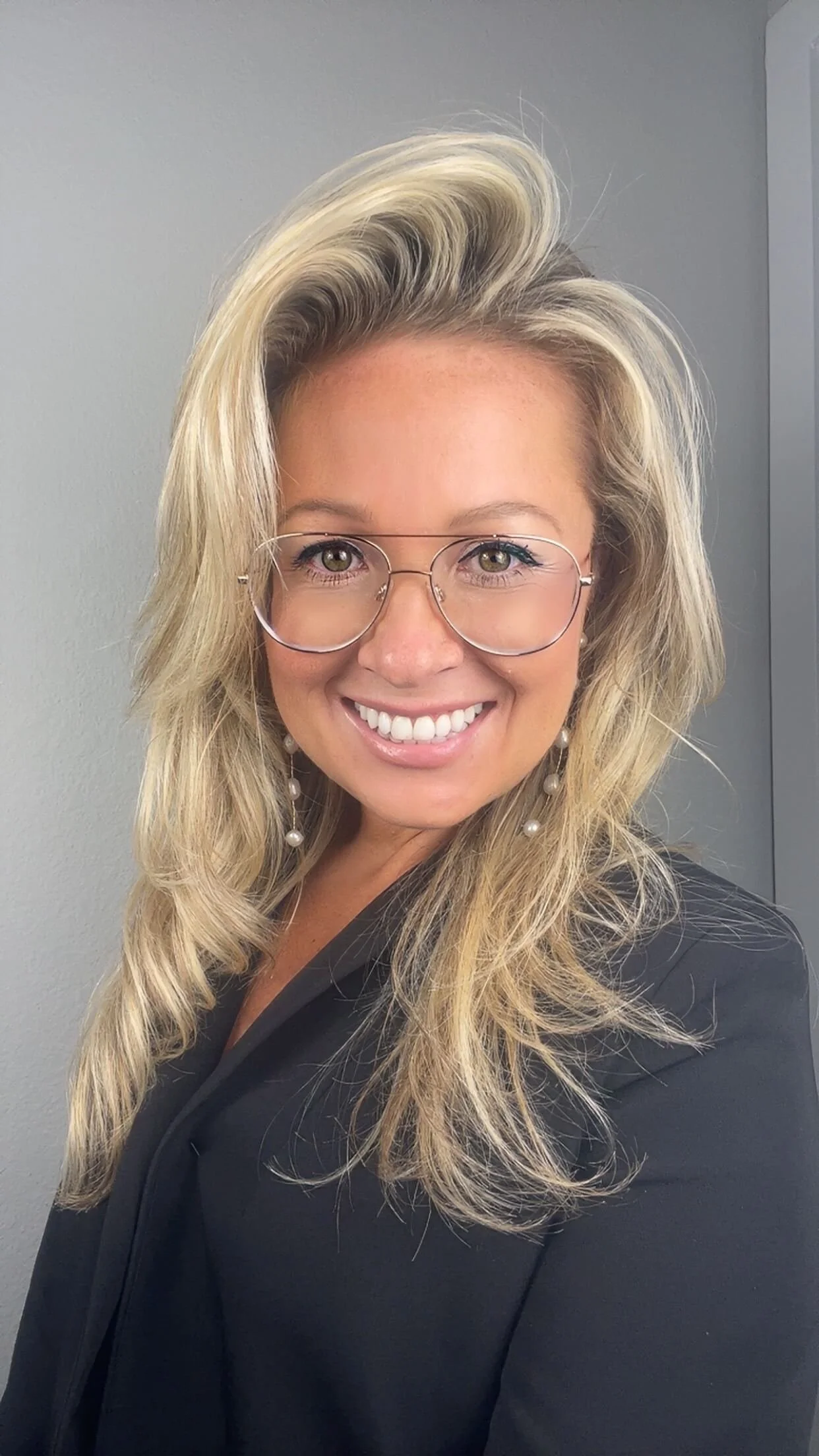 Jaden Nazarian, Creative Director and founder of Truly Social, smiling in a professional headshot