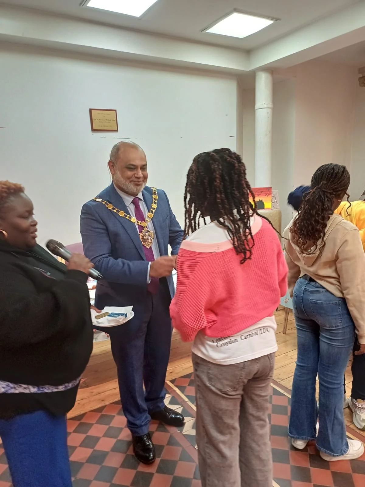 TVI Founder: receiving the Be Different365 Foundation Young Entrepreneurship Leadership Badge by Croydon Deputy Civic Mayor: Councillor Mohammed Islam